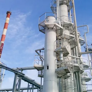 Tall distillation column used in mass transfer operations for component separation in chemical processing