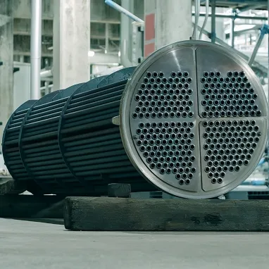 Shell and tube heat exchanger in a chemical plant, showing tube bundle and front head